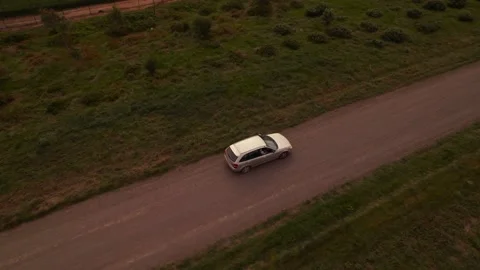 HD Drone shot of tracking a car in a dirt road Stock Footage 163186089
