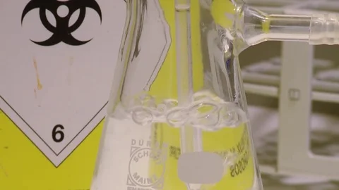 HD Erlenmeyer flask with a solution inside Stock Footage 82618390