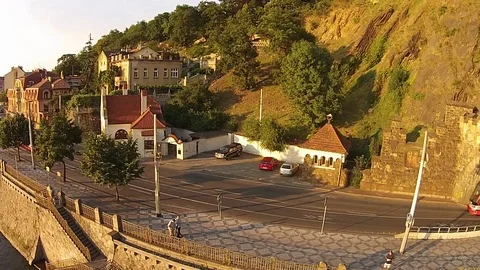 HD EXT DAY aerial going trams along the river with a rock in the back 動画素材 73425269