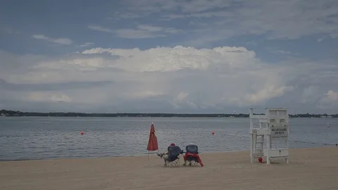 HD EXT DAY static beach with a lifeguard point and red umbrella 動画素材 73803030