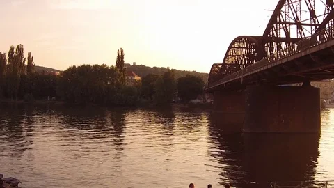HD EXT DUSK aerial moving shot railway bridge at the river Stock Footage 73425268