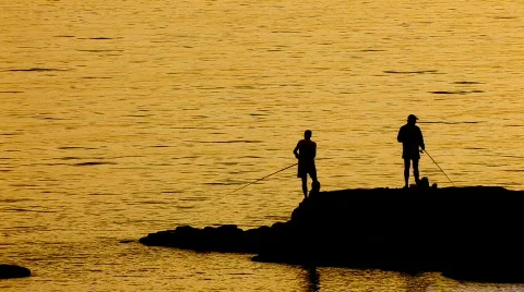 HD Fishing at  sunset Stock Footage 592018