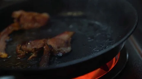 HD | Flipping Cooking Bacon Stock Footage 76708518