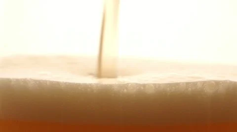 HD - Foam beer pours Stock Footage