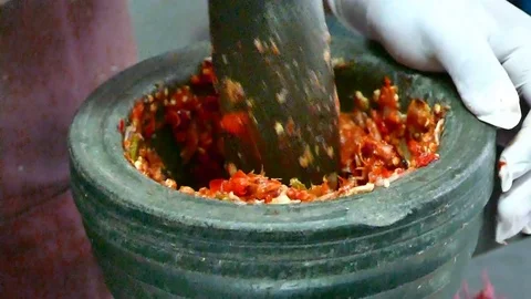 HD footage, close up hand pounding spices in stone mortar. 스톡 동영상 70837784