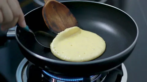 HD Footage of hand Flipping breakfast pancakes Stock Footage 44892895
