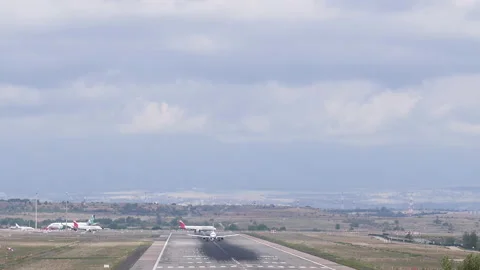 HD Footage of a plane taking off from the runway of Madrid Barajas Airport Stock Footage 163720522