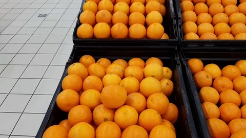HD footage of various types of an orange on a display for sale in a supermarket Video stock 100322730