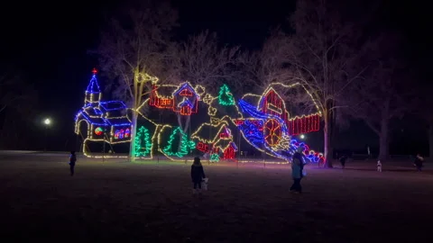 HD Giant Christmas Theme Lighting Display in Park at Night Stock Footage 256551962