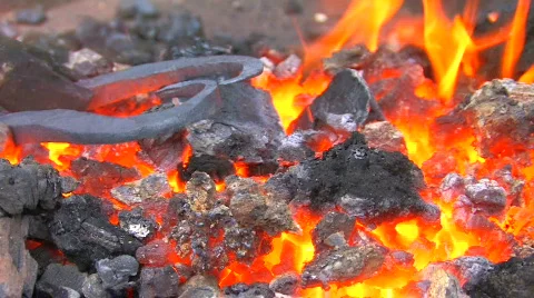 HD Glowing iron pattern ready for blacksmith, closeup Stock-Footage 636860