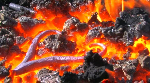 HD Glowing iron pattern ready for blacksmith, closeup Stock-Footage 636869