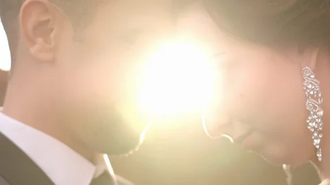 HD Groom and Bride head to head. Sunny background. closeup shot Vidéo 97169341