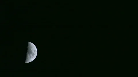 HD Half moon in the dark sky, timelapse Stock Footage 595567