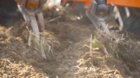 HD The implement of a tractor plowing the land of cultivation Stock Footage 92845437