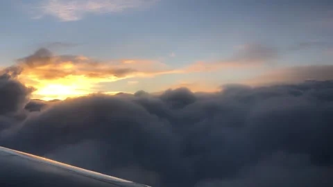 HD - Looking at the Sunset from the Plane Window Stock Footage 141806702