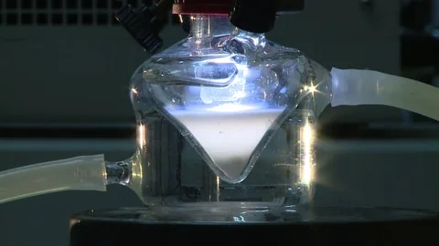 HD Luminescent liquid inside a flask Stock Footage 82618358