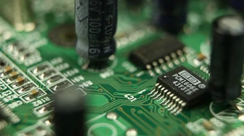 HD Macro, Motion Control Over Electronics Parts On A Real Circuit Board Stock Footage 8765506