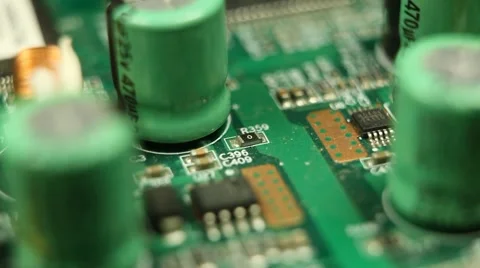 HD Macro, Motion Control Over Electronics Parts On A Real Circuit Board Stock Footage 8765570