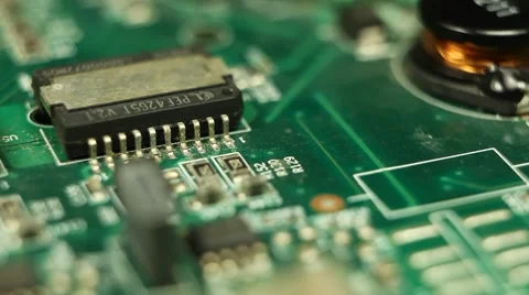 HD Macro, Motion Control Over Electronics Parts On A Real Circuit Board Stock Footage 8765726