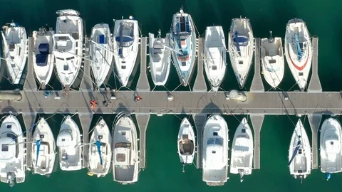 HD Monoco Top down aerial view of jetty with boats and people Stock Footage 119537271