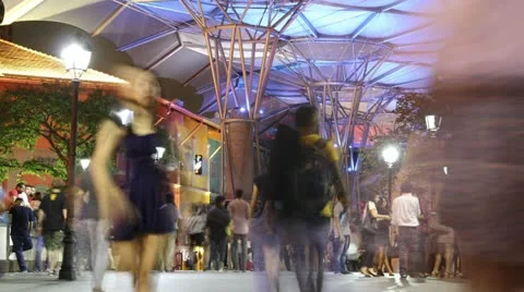 HD night time lapse of people walking at Singapore- Clarke Quay Bridge Stock Footage