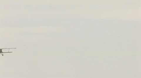 HD Old biplane flying in clear sky Stock-Footage 548492