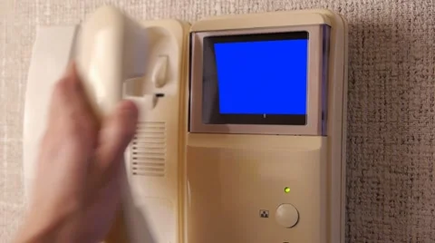 HD - Pick up the phone intercom Stock Footage 8961589