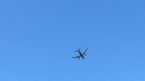 HD Plane Flies Away Stock Footage 1042054