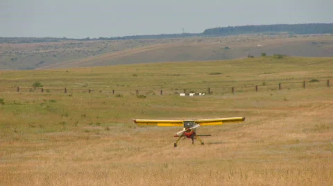 HD plane with propeller run in the middle of the field Stock Footage 515794