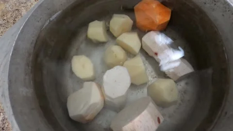 HD preparing viandas root veggies verdura plate 1 Stock Footage 232970436