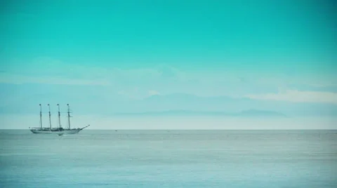HD Sailing Ship and Mountains Stock Footage 29675007