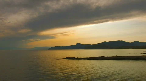 HD sea and rocks at sunset with clouds  Stock-Footage 592002