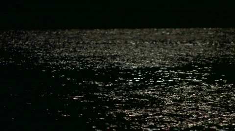 HD sea surface in the moonlight, defocused Stock Footage 592066