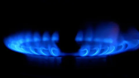 HD - Slow ignition of a blue flame on gas stove Stock Footage 105680873
