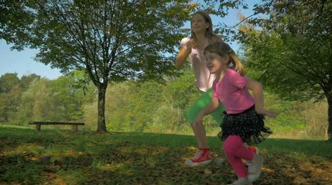 HD Slow-Mo: Children Running along Playground Vidéo 42762492