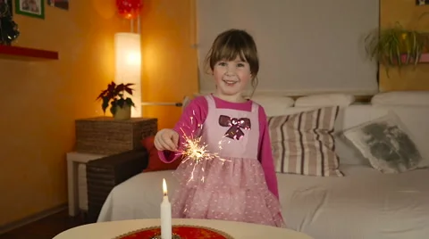 HD Slow-Mo: Cute Little Girl Holds and Play with Sparkler Vidéo 57753441