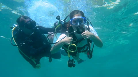 HD Slow-Mo: Scuba Diving Thumb Up Stock-Footage 66339266