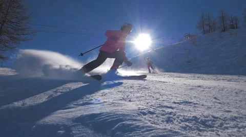 HD Slow-Mo: Two Girls Pass and Spray Snow 库存影片 59840211