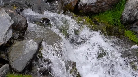 HD. Slow motion. Beautiful image of a thawing stream of Sierra Nevada in Granada Video stock 76976546
