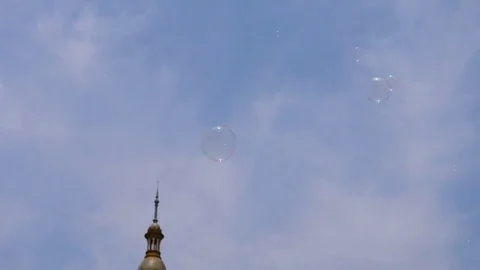 HD. Slow motion. Beautiful image of soap bubbles flying towards the sky Stock Footage 76976606