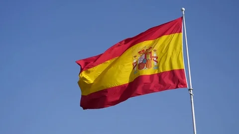 HD. Slow motion. Flag of Spain waving in the wind Video stock 76584371