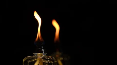 HD slow motion flame of a flame from a scent diffuser in the dark Stock Footage 128175283