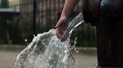 HD Slow Motion Playing with water from Fire Hydrant Stock Footage 67431742