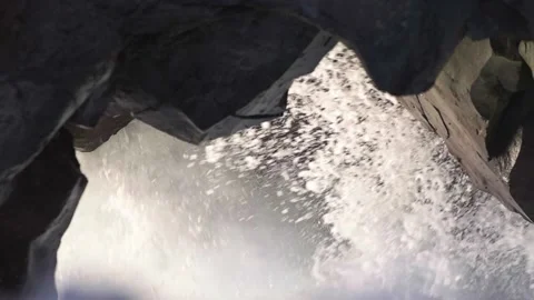 HD Slow motion shot of waves splashing into sea cave. Lanzarote, Spain Stock Footage 168346243