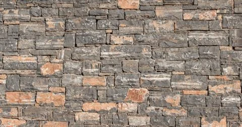 HD Texture of a stone. Old stone wall texture background. Grey stone wall as  Stock Photos