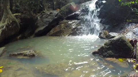 HD Tilt up small waterfall in deep forest, South of Thailand Video stock 39862502