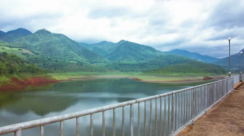 HD Time lapse Dam and mountain moving cloud Stock Footage 39788003