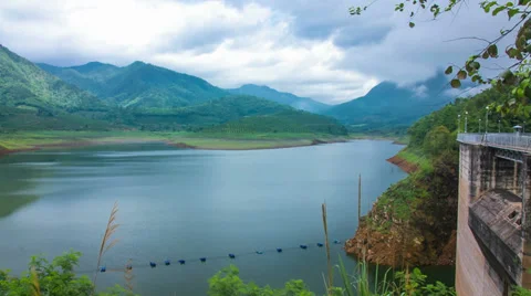 HD Time lapse Dam and mountain moving cloud Stock Footage 39788600