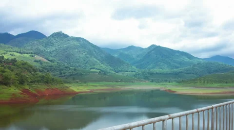 HD Time lapse Dam and mountain moving cloud Stock Footage 39789772