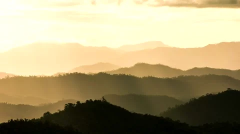 HD Time lapse hill gold sun beam pan right Stock Footage 40091549